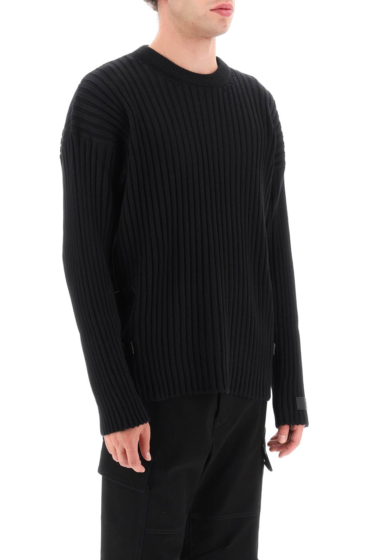 Versace Versace ribbed-knit sweater with leather straps