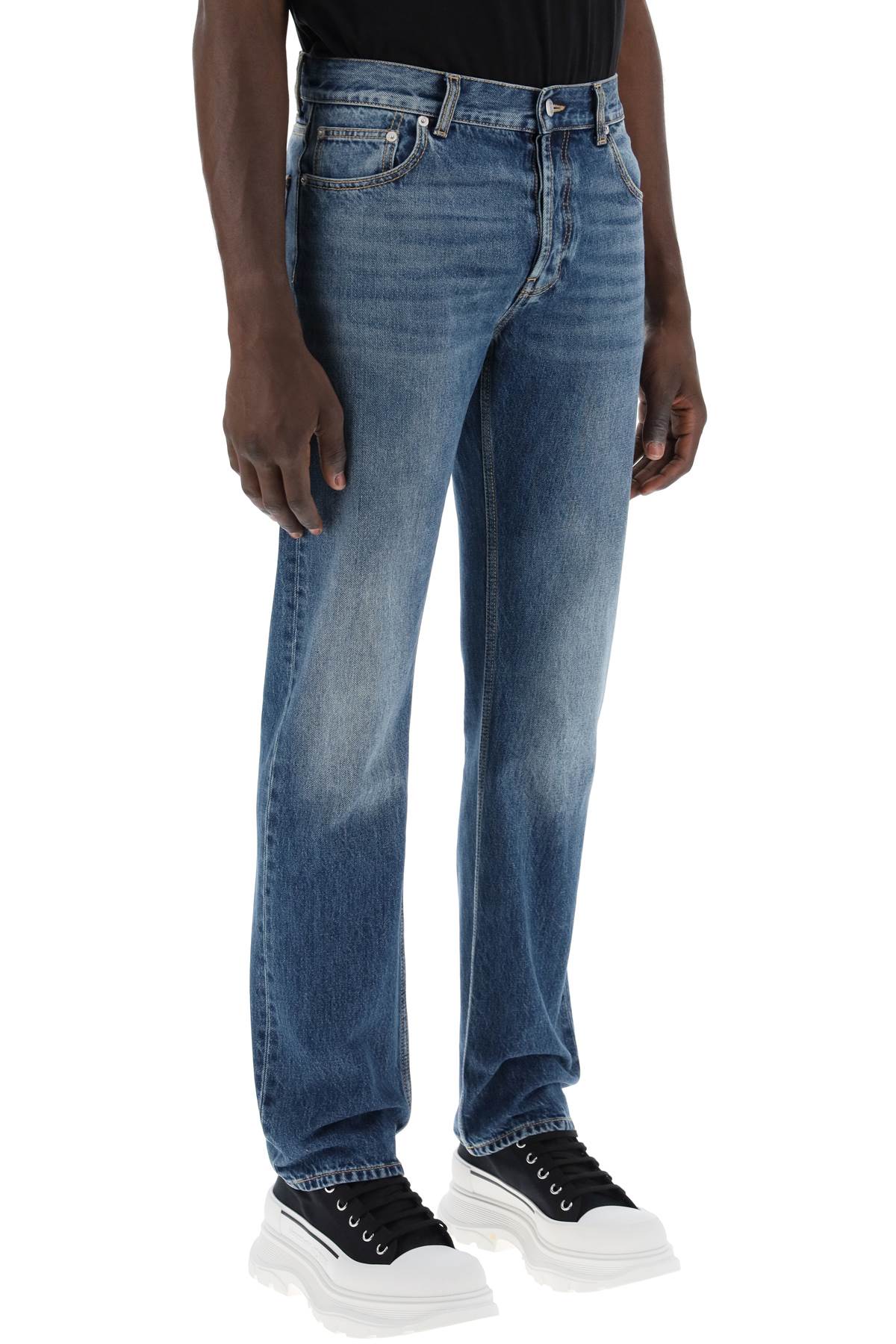 Alexander Mcqueen Alexander Mcqueen straight leg jeans with faux pocket on the back.