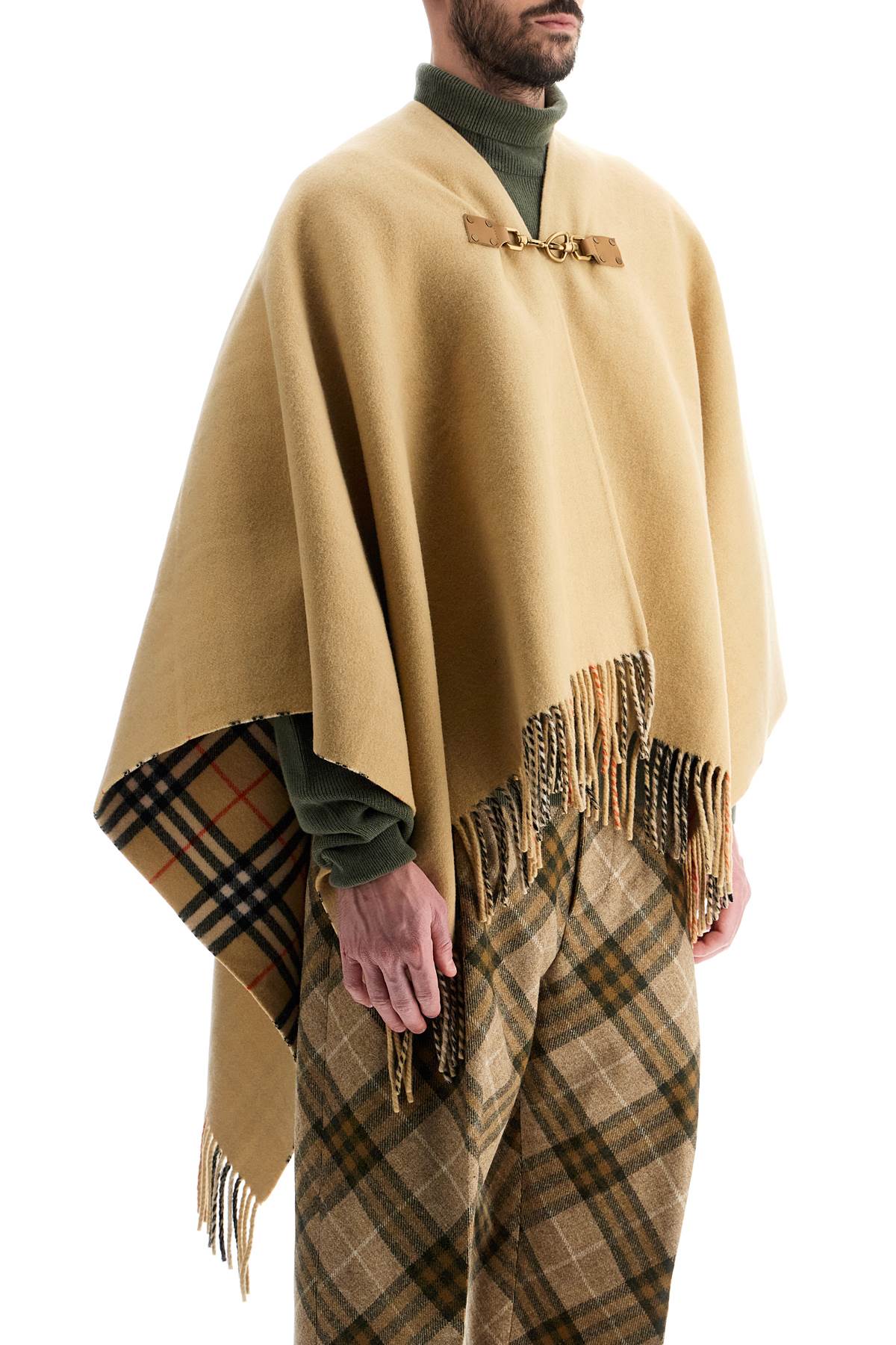 Burberry wool cape with fringes.