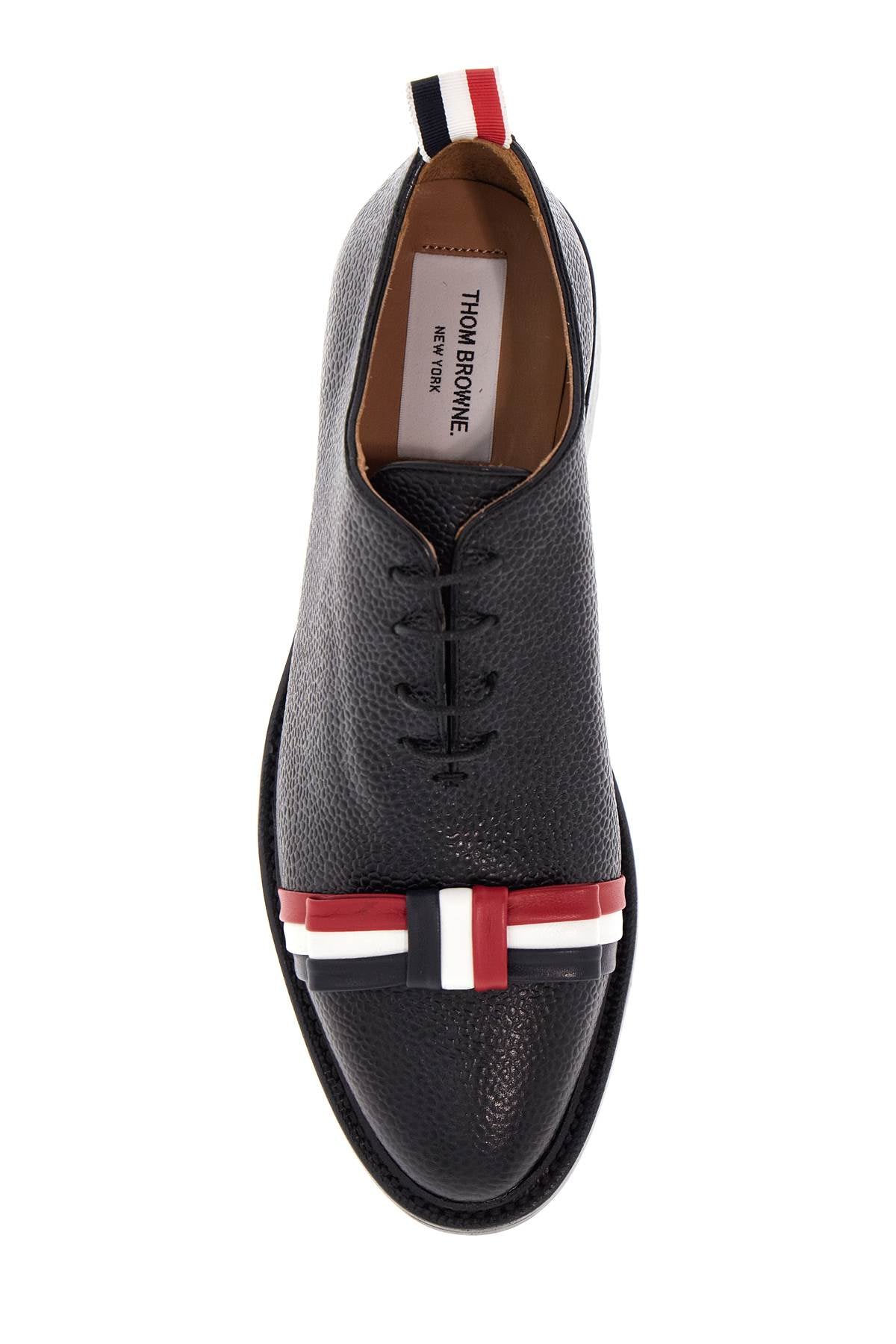 Thom Browne elegant wholecut shoes in black calfskin with rwb bow